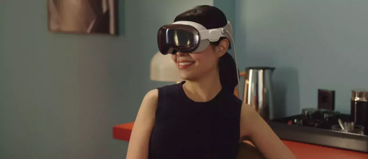 young woman wearing apple vision pro