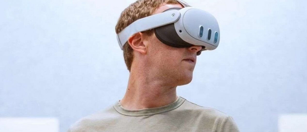 Zuckerberg wearing VR headset