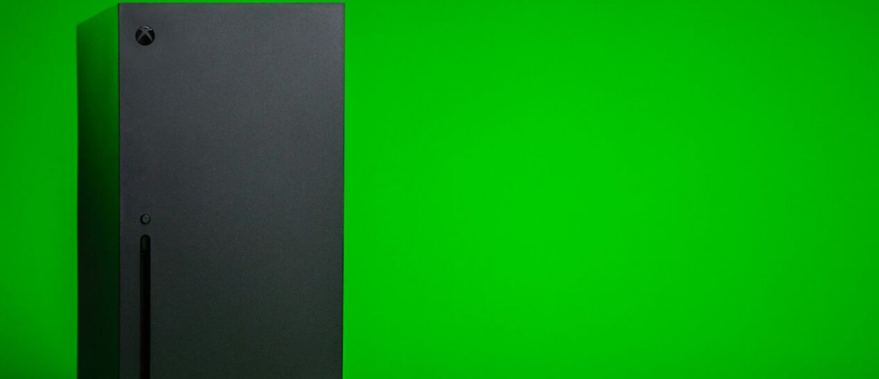 black xbox in green background