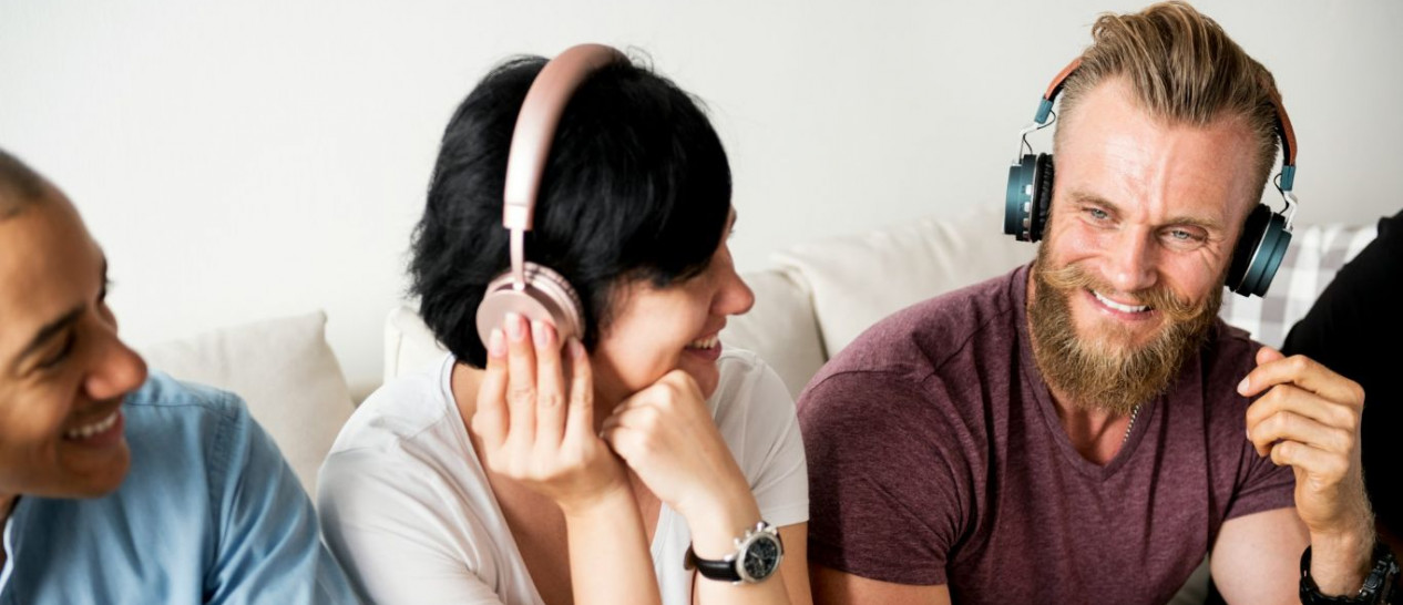 friends share headphones