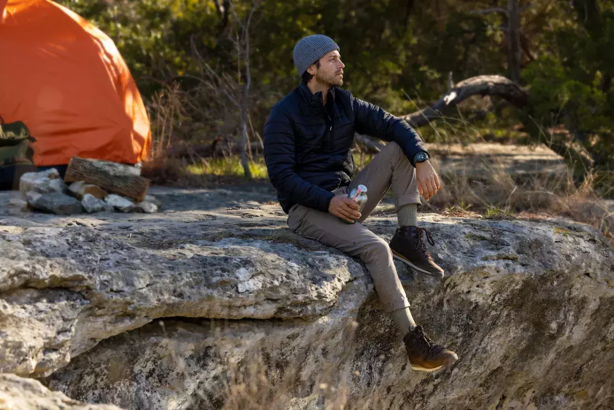 guy in the mountain with GARMIN INSTINCT®️ 2X SOLAR