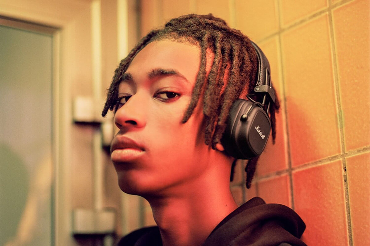 male teenager with MARSHALL Major IV headsets