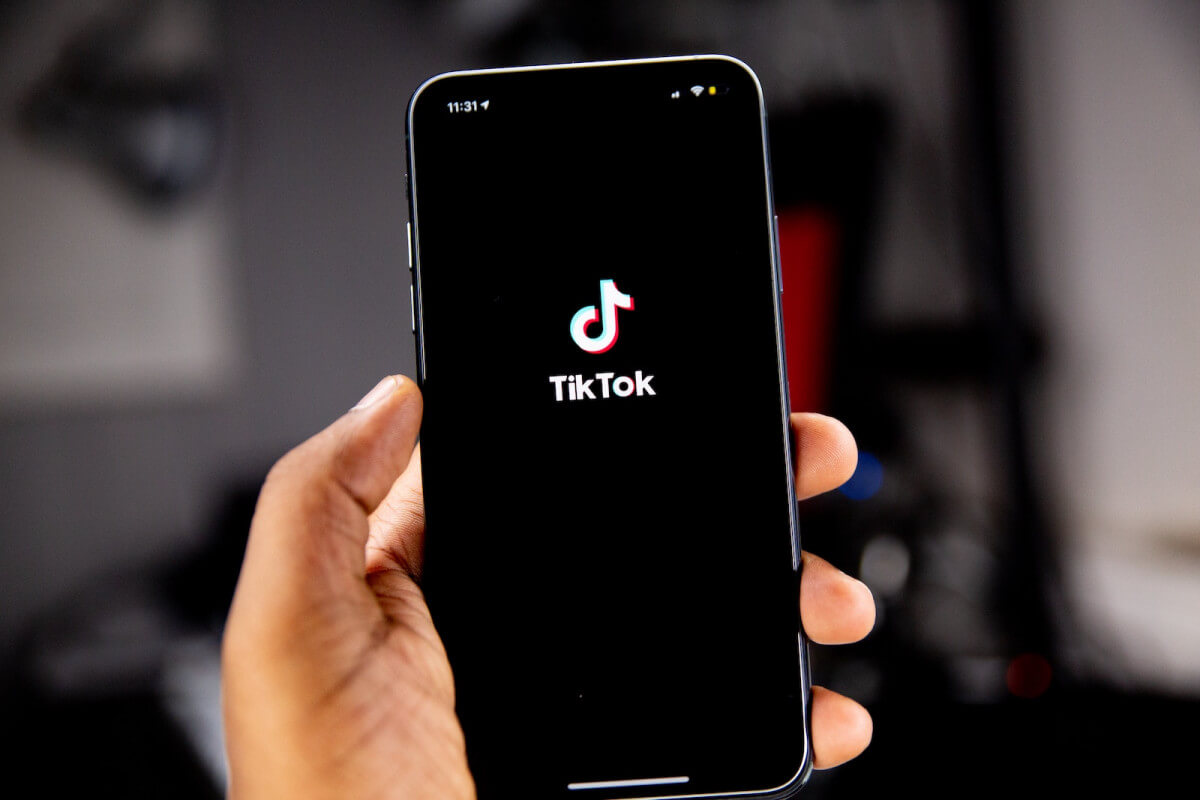 smartphone with TikTok app logo on screen