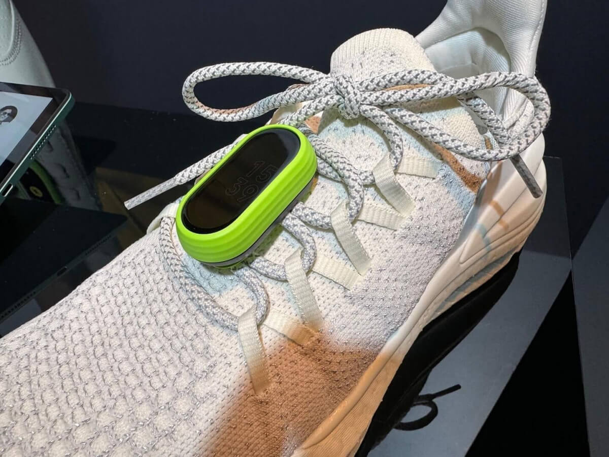 XIAOMI Smart Band 8 on white running shoe