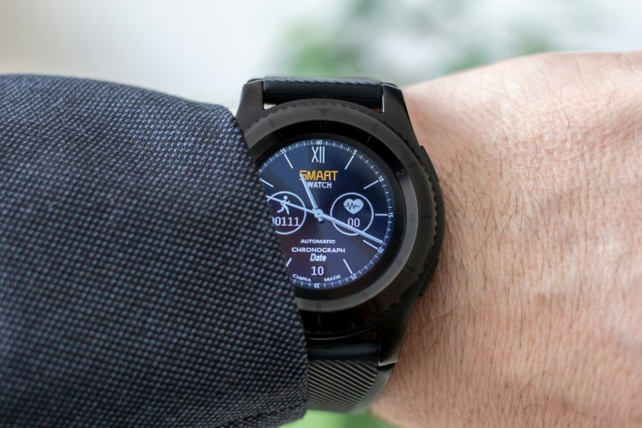 black smartwatch on wrist