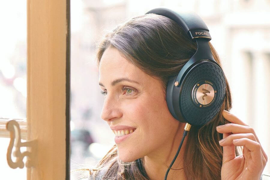 woman with wired hi-fi headphones