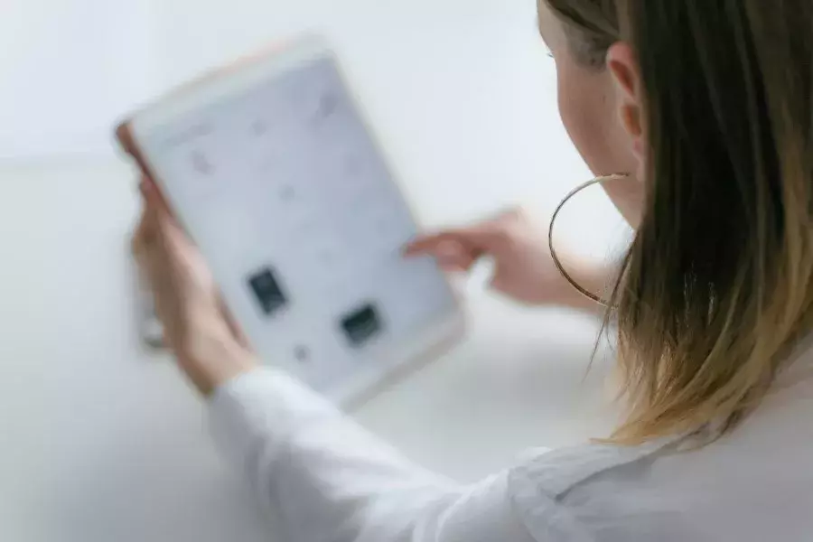 young woman using tablet